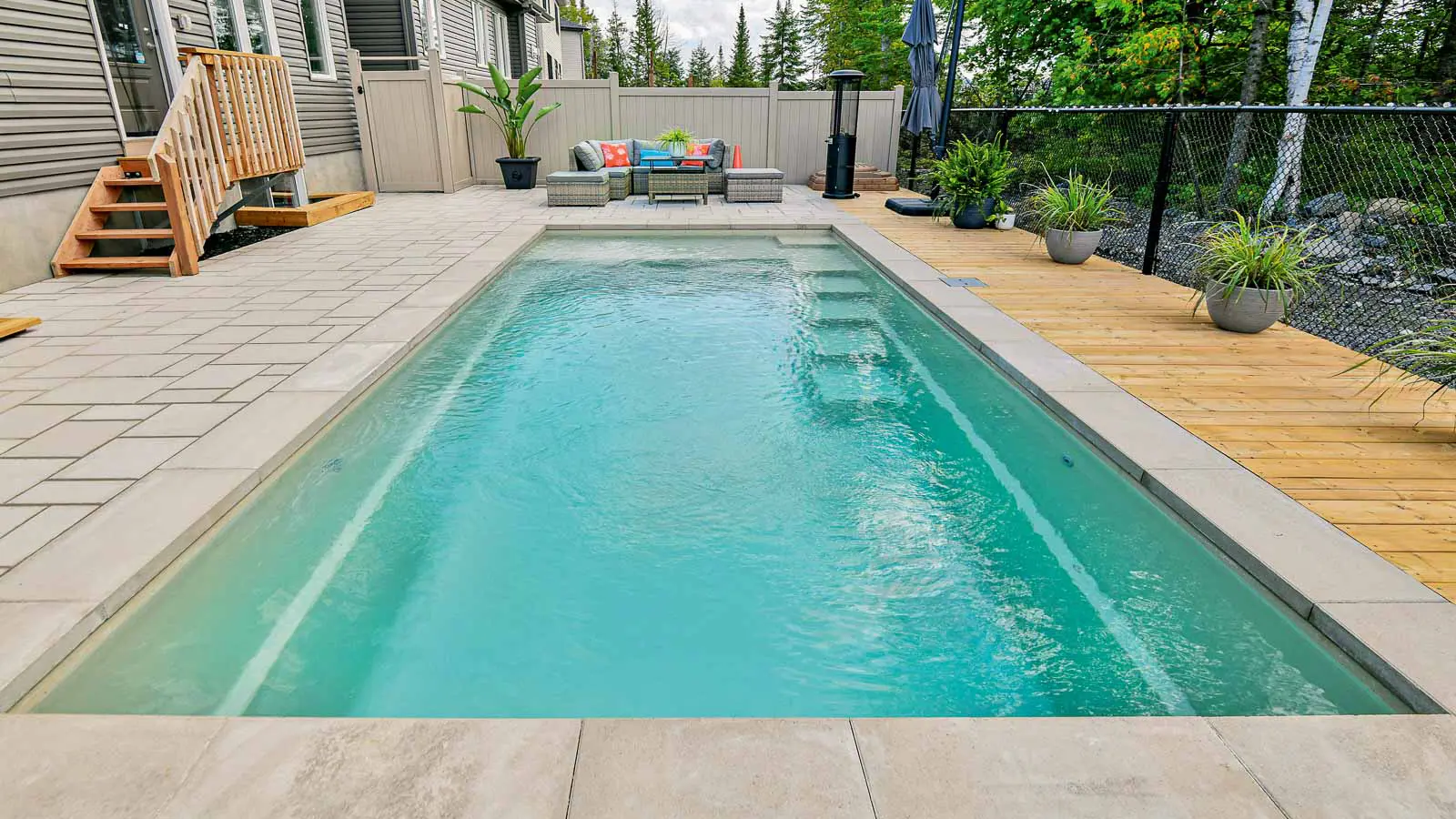 Leisure-Pools-Precision-Fiberglass-Pool-Shape The Precision™, a fiberglass pool design manufactured by Leisure Pools