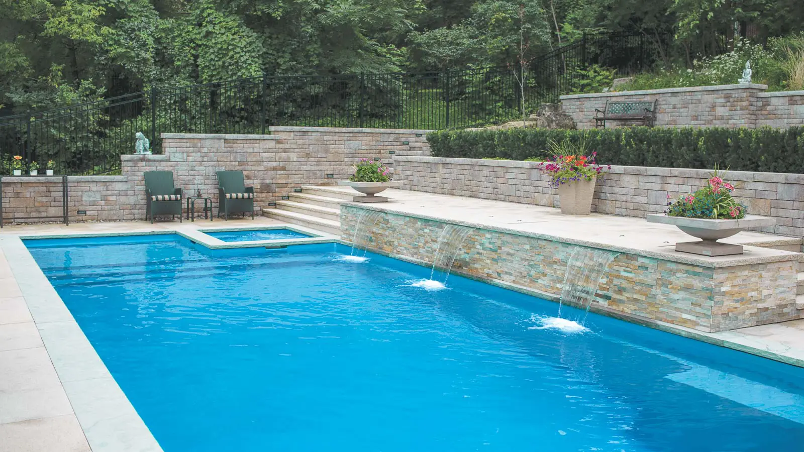 The Ultimate™, a fiberglass pool design manufactured by Leisure Pools